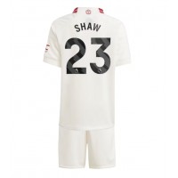 Fotballdrakt Barn Manchester United Luke Shaw #23 Tredjedraktsett 2023-24 Kortermet (+ Korte bukser)